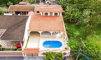 Imagem: Casa com 4 quartos para venda em Matinhos