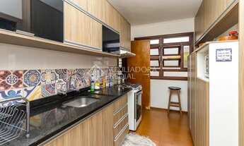 Imagem 6: Apartamento para venda possui 76 metros quadrados com 2 quartos em Auxiliadora - Porto Ale