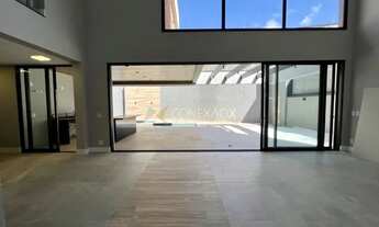 Imagem 5: Casa de condomínio para venda possui 357 metros quadrados com 4 quartos