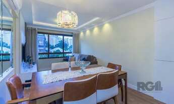 Imagem 2: Apartamento 2 dormitórios , semimobiliado ,andar alto com duas suítes, lavabo e vaga dupla