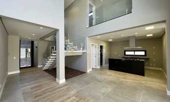 Imagem 6: Casa de condomínio para venda possui 357 metros quadrados com 4 quartos