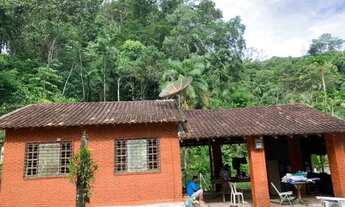 Imagem: Vendo belíssimo chalé entre montanha e