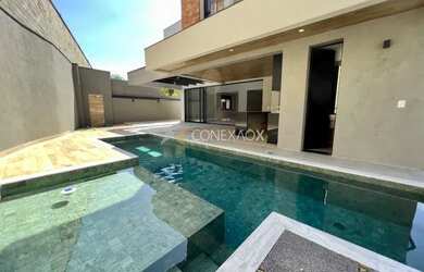 Imagem 2: Casa de condomínio para venda possui 357 metros quadrados com 4 quartos