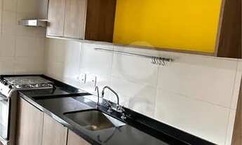 Imagem 4: Apartamento moderno no Itaim com cozinha com conceito aberto