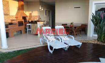 Imagem 4: Casa de condomínio para venda tem 450 metros quadrados com 5 quartos