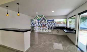 Imagem 4: Casa de condomínio para venda tem 275 metros quadrados com 3 quartos.