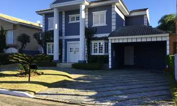 Imagem 3: Casa de condomínio para aluguel e venda possui 400 metros quadrados com 4 quartos