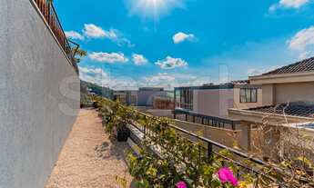 Imagem 7: Casa de condomínio para aluguel possui 390 metros quadrados com 4 quartos