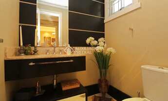 Imagem 4: Casa de condomínio para venda possui 299 metros quadrados com 3 quartos