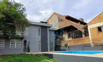 Imagem 2: Casa com 3 dormitórios para alugar, 225 m² por R$ 5.000/mês - Ouro Branco - Novo Hamburgo