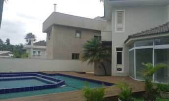 Imagem 4: Casa de condomínio para aluguel e venda possui 463 metros quadrados com 4 quartos