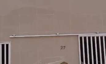 Imagem 6: Casa em rua pública