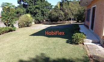 Imagem: Terreno a venda com 1 casa de 2 pisos e