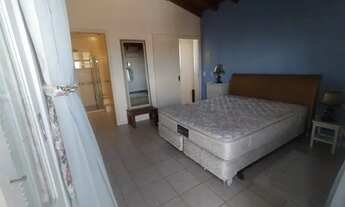 Imagem 3: Casa deslumbrante com 5 quartos, piscina aquecida e amplo pátio em Xangri-lá