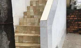 Imagem 2: Casa reformada + cobertura em construção