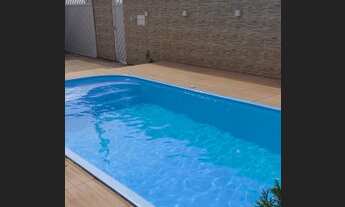 Imagem 6: A casa está localizado no bairro Cosmos tem 100 metros quadrados com 3 quartos sendo 3 sui