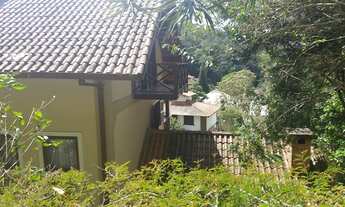 Imagem 7: Casa de condomínio para venda possui 400 metros quadrados com 5 quartos