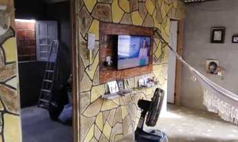 Imagem 2: Casa com três quartos, duas salas, dois banheiros, cozinha e área de serviço