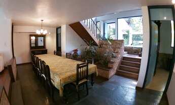 Imagem 4: Casa de condomínio para venda tem 450 metros quadrados com 5 quartos