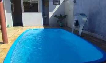 Imagem 2: Casa com dois quartos duas cozinhas dois banheiros um suíte piscina garagem pra carros