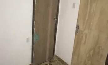 Imagem 7: Casa reformada + cobertura em construção