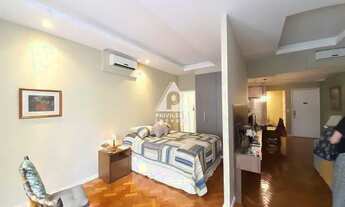 Imagem 6: Apartamento tipo studio com sala, lavabo, quarto (suite), cozinha e área