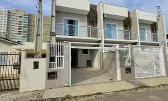 Imagem 2: Sobrado Geminado a 280 metro do mar com 1 suíte + 2 dormitórios - Itacolomi