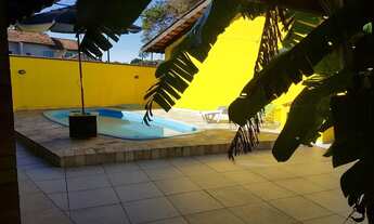 Imagem 3: Casa com piscina em Guaratuba, três quartos e churrasqueira