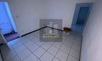 Imagem: Quarto, sala e cozinha na Vila Monumento