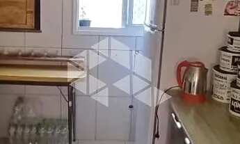 Imagem 2: Apartamento com 2 quartos, 1 suíte , 1 banheiro social e garagem