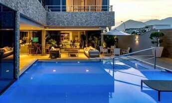 Imagem 6: Casa de condomínio para aluguel tem 600 metros quadrados com 4 quartos