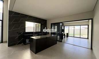 Imagem 2: Sobrado com 4 quartos sendo 3 suítes disponível para a venda no bairro Laranjeiras em Uber