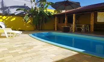 Imagem 4: Casa com piscina em Guaratuba, três quartos e churrasqueira