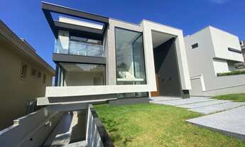 Imagem 2: Casa de condomínio para venda com 555 metros quadrados com 5 quartos