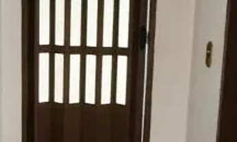 Imagem 2: Apartamento térreo composto por 1 dormitório, sala, cozinha, banheiro e área de serviço. E