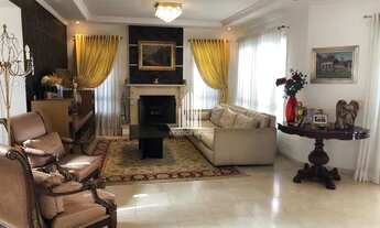 Imagem 7: Casa com 485 de área total, 4 suítes, 8 vagas, piscina, churrasqueira, aquecimento com pla