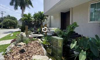 Imagem 3: Luxuosa Casa Triplex com 4 Suítes, Piscina e Área Gourmet em Condomínio Fechado