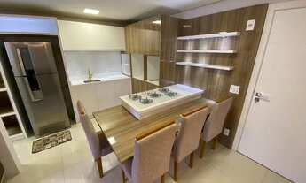 Imagem 6: Apartamento semimobiliado com 1 suíte, sala com sacada, cozinha, área de serviço e 1 vaga