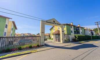 Imagem 2: Apartamento para venda possui 59 metros quadrados com 3 quartos em Pinheirinho - Sacada co