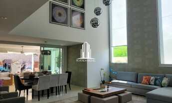 Imagem 3: 3 suítes, 5 banheiros, 3 garagens, repleta de armários, lazer completo