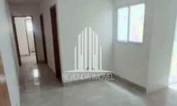 Imagem 3: Apartamento sem condomínio com 2 quintais, 2 dormitórios e 1 vaga de garagem na Vila Helen