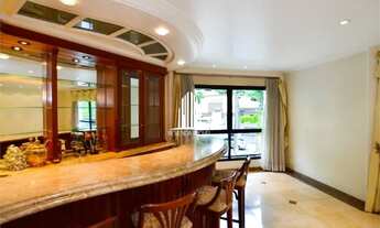 Imagem 2: 4 quartos, 2 suites, 4 vagas, 5 banheiros