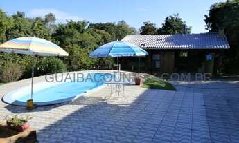 Imagem 3: Sítio com 2.900m², casa e galpão com 250m², 3 quartos, piscina.