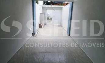 Imagem 2: Sobrado a venda no Jardim Prudência com 3 quartos, sendo 1 suíte, 2 vagas, quintal com chu