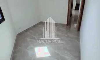 Imagem 4: Apartamento sem condomínio com 2 quintais, 2 dormitórios e 1 vaga de garagem na Vila Helen