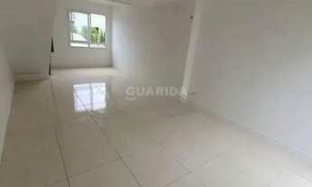 Imagem 2: Casa em condomínio com 2 dormitórios e 1 vaga de garagem no bairro Vila Nova