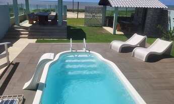 Imagem: Casa pé na areia