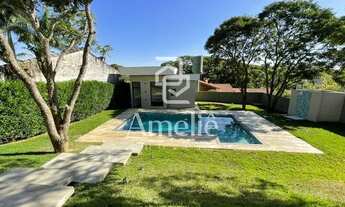 Imagem 2: Casa de Alto Padrão com 3 suítes, área gourmet com churrasqueira e piscina Terras de Itaic