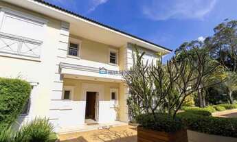 Imagem 4: Casa nova de alto padrão em condomínio fechado, jardim, piscina, em região arborizada e se