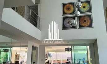 Imagem 4: 3 suítes, 5 banheiros, 3 garagens, repleta de armários, lazer completo